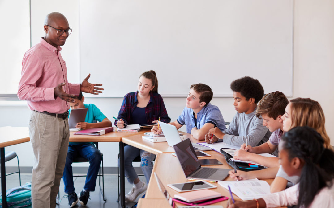 Teacher Teaching High School Students